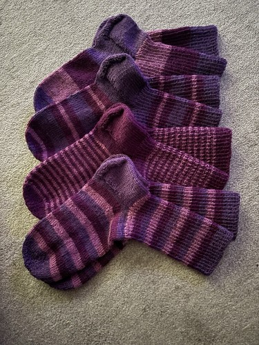 Vier paar selbstgestrickte - vier,